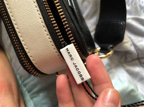 how to spot a fake marc jacobs makeup bag|authentic marc jacobs tote bag.